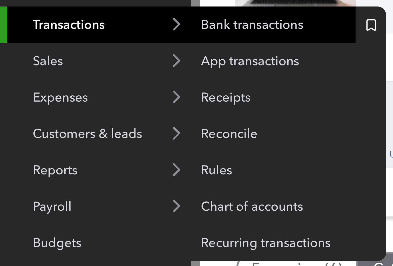 QuickBooks Online left navigation menu expanded, showing multiple sections including Transactions, Sales, Expenses, Customers & leads, Reports, Payroll, and Budgets. The Transactions menu is open with Bank transactions highlighted, indicating the first step to access categorized bank entries.