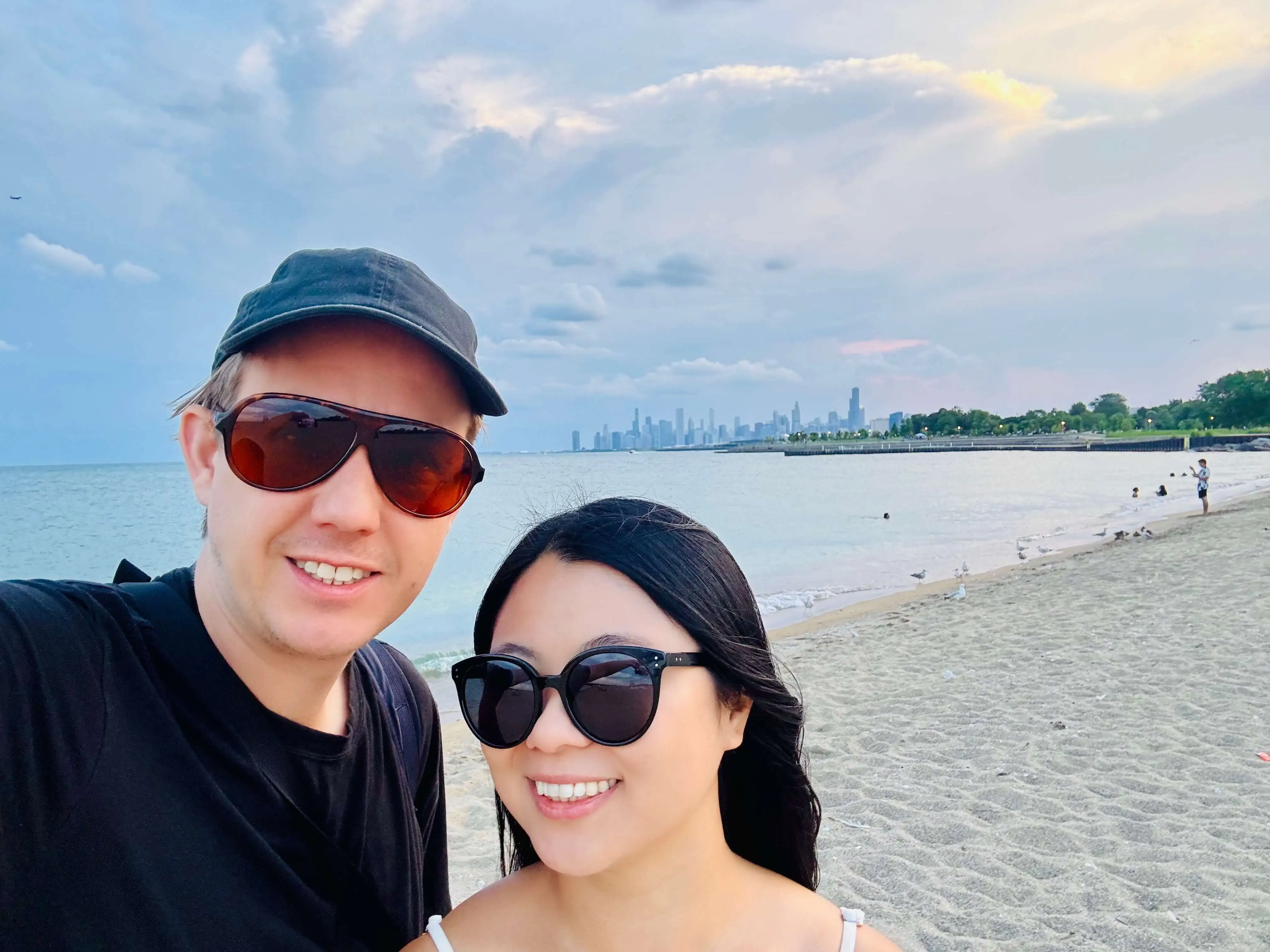 Receipt-AI.com founders: Queenie Peng and Ian Heraty on the 41st Chicago beach with the city skyline in the background, highlighting the startup’s roots in Chicago.