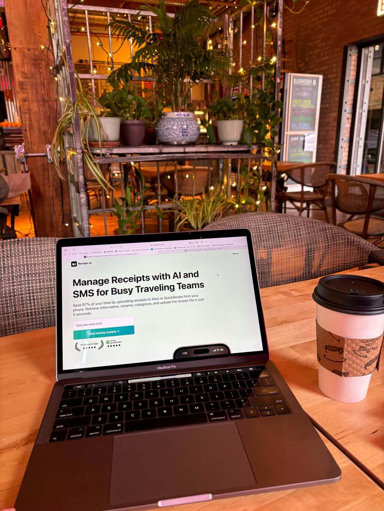 You Only Get One Life: A laptop showing the Receipt AI website on a cafe table, reflecting a founder's note about loving the work you choose to do.